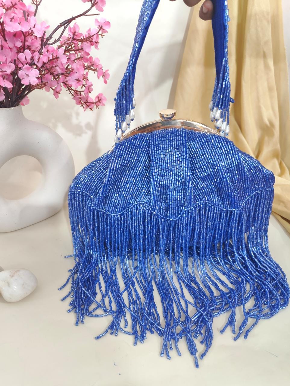 Rihana inspired tasssel clutches