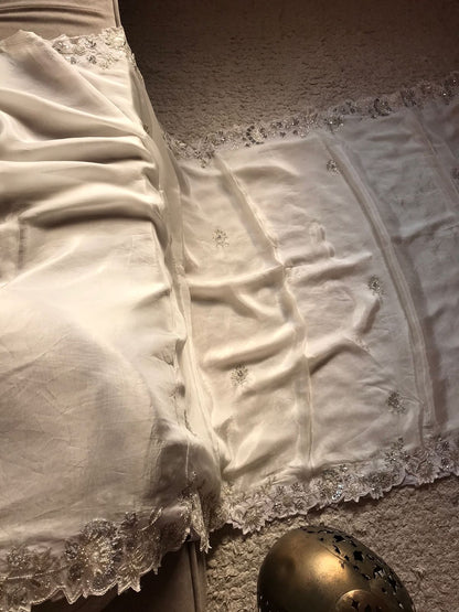 White fairly zardosi saree