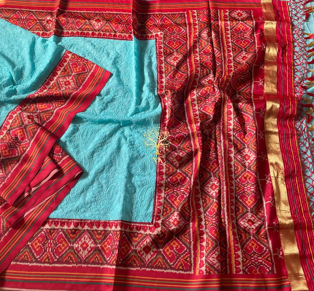 Aqua chikankari patola bordered sari