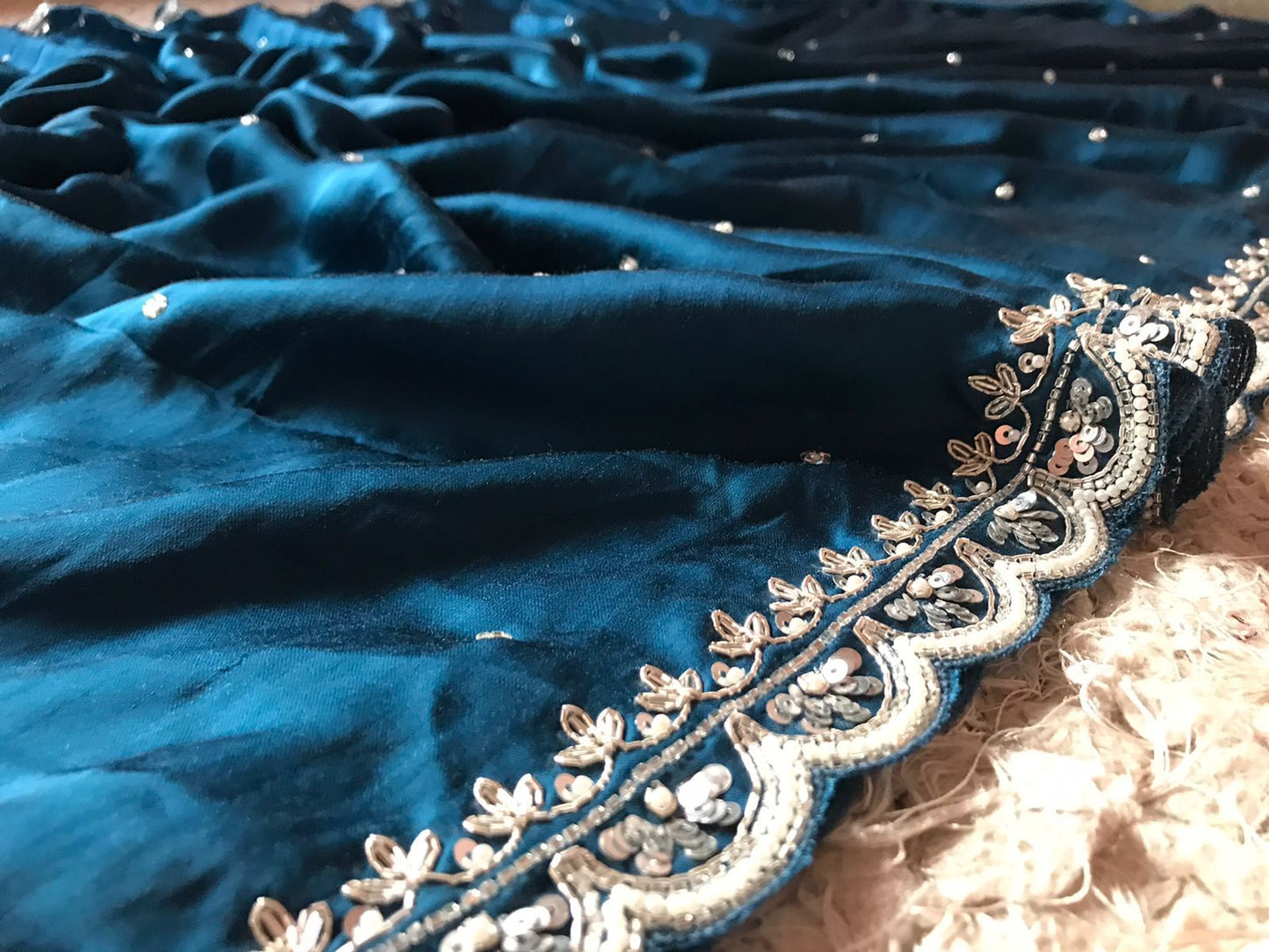 Teal blue satin saree