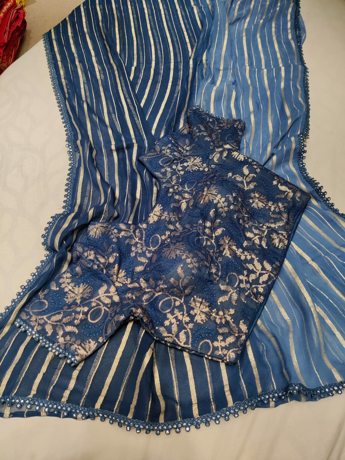 Shaded striped organza saree