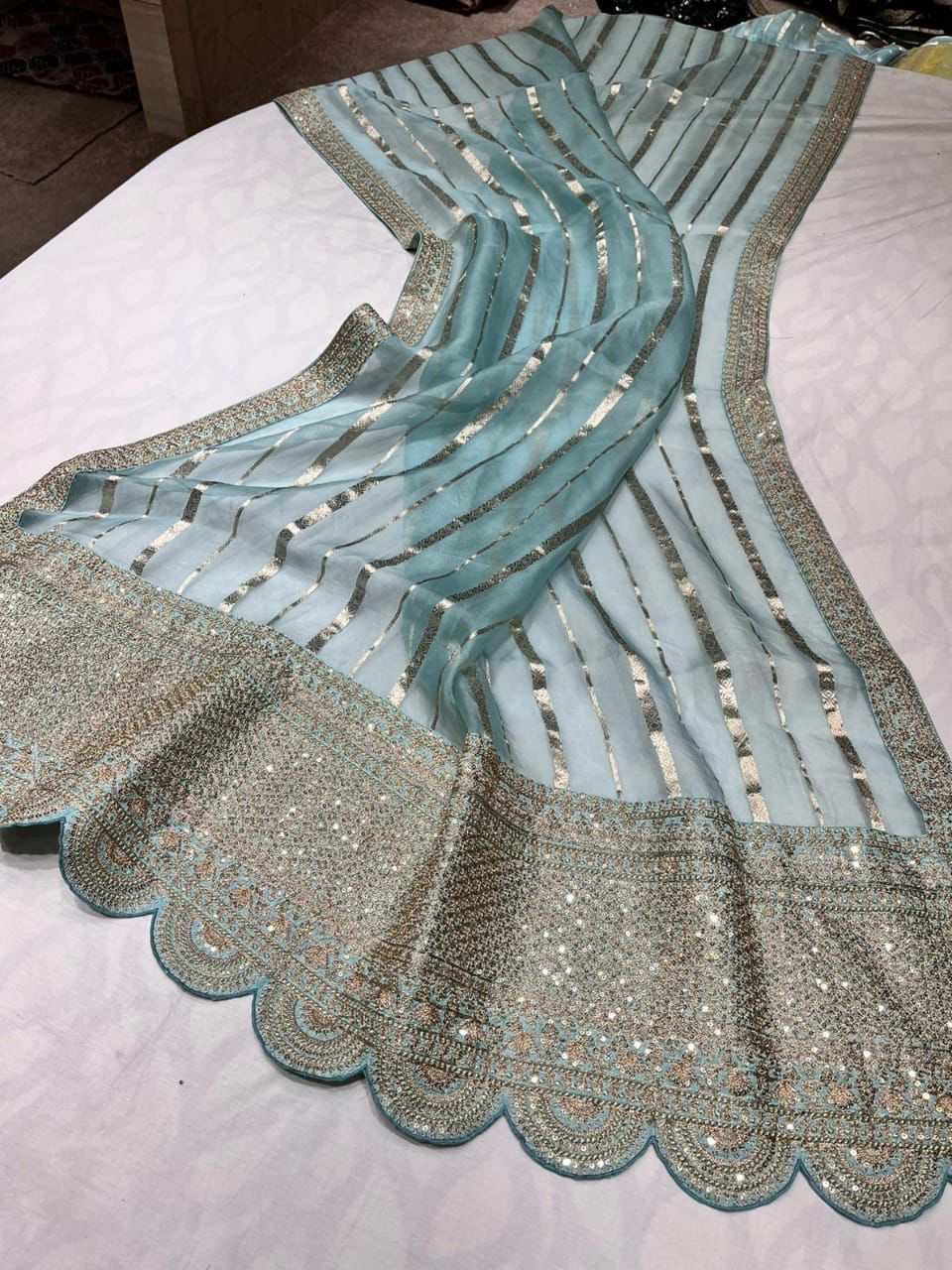 Arvenia striped organza saree