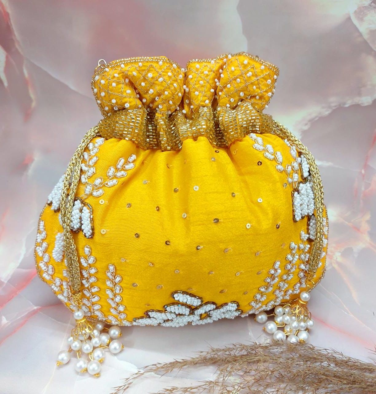 Aviksha embroidered potli handmade potlis designer potlis