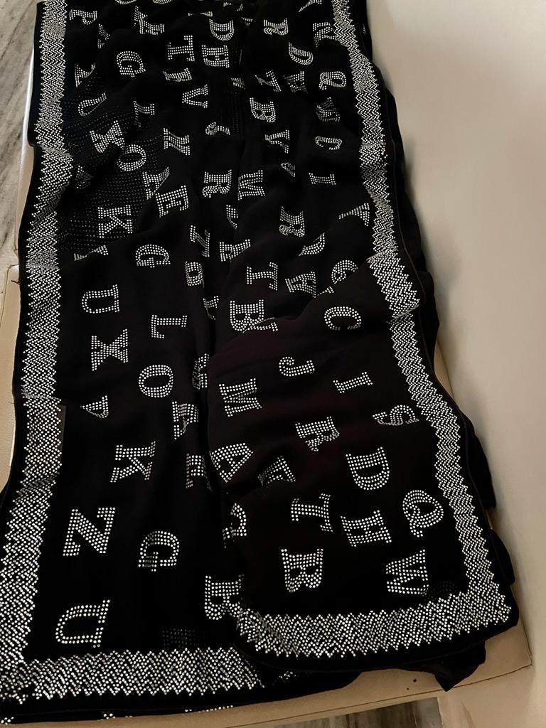 Alphabetic inspired black Swarovski saree